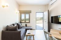 Televízia a/alebo spoločenská miestnosť v ubytovaní Panorama Luxury Rooms