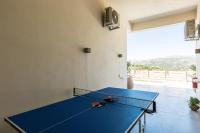 Stolný tenis v ubytovaní Panorama Luxury Rooms alebo v jeho okolí