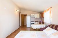 Kuchyň nebo kuchyňský kout v ubytování Apartments Golubić