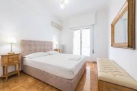 Posteľ alebo postele v izbe v ubytovaní Victoria Supreme Suite