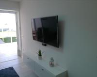 TV a/nebo společenská místnost v ubytování Cozy Luxury