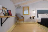 Posteľ alebo postele v izbe v ubytovaní Villa Elaia Suites & Apartments No.7