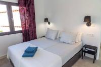 Postel nebo postele na pokoji v ubytování Villa La Zenia