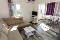 TV a/nebo společenská místnost v ubytování Holiday home Villa Sahara