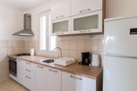 Kuchyň nebo kuchyňský kout v ubytování Holiday home Villa Sahara
