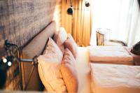 Postel nebo postele na pokoji v ubytování Boutique Hotel Das Rivus