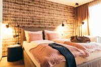 Postel nebo postele na pokoji v ubytování Boutique Hotel Das Rivus