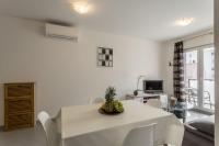 Televízia a/alebo spoločenská miestnosť v ubytovaní COOL APARTMAN