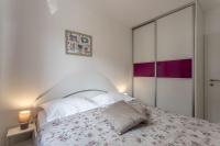 Posteľ alebo postele v izbe v ubytovaní COOL APARTMAN