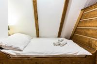 Posteľ alebo postele v izbe v ubytovaní Apartament Bajkowy & Dwupoziomowy Krzesany