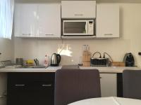 Kuchnia lub aneks kuchenny w obiekcie Piknik Apartmant