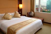 Guangdong Hotel-Free Shuttle & Registration Counter Service during Canton Fairにあるベッド