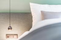 Postel nebo postele na pokoji v ubytování Lifestylehotel dasMAX