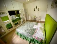 Postel nebo postele na pokoji v ubytování El Malecon B&B Hotel