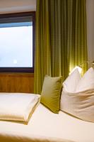 A bed or beds in a room at ArtiHome