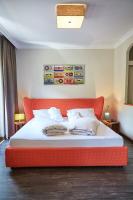 Posteľ alebo postele v izbe v ubytovaní THOMSN Central Hotel & Appartements