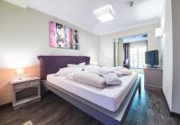 Posteľ alebo postele v izbe v ubytovaní THOMSN Central Hotel & Appartements