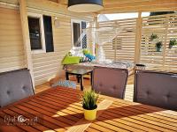 Posedenie v ubytovaní West Coast Mobilhome with XXL Terrace