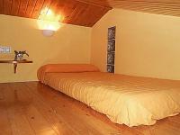 A bed or beds in a room at Apartamentos Turismo Rural Casa Santorroman