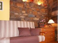A seating area at Apartamentos Turismo Rural Casa Santorroman
