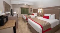 Ein Bett oder Betten in einem Zimmer der Unterkunft Ramada by Wyndham &amp; Suites South Padre Island