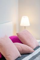 Posteľ alebo postele v izbe v ubytovaní Apartament Bursztyn II Klifowa