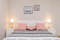 Posteľ alebo postele v izbe v ubytovaní Apartament Bursztyn II Klifowa