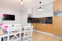 Kuchyňa alebo kuchynka v ubytovaní Apartament Bursztyn II Klifowa