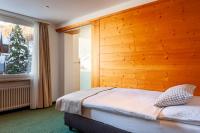 Ein Bett oder Betten in einem Zimmer der Unterkunft Hotel Jägerhof