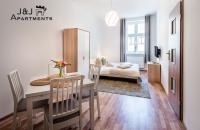 Posteľ alebo postele v izbe v ubytovaní J&J Apartments, Szeroka 25 Apartament 7