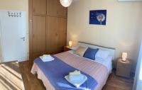 Łóżko lub łóżka w pokoju w obiekcie Duplex Apartment with Private Swimming Pool