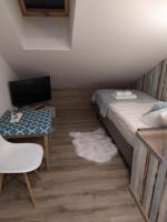 Posteľ alebo postele v izbe v ubytovaní Apartament KAOLA
