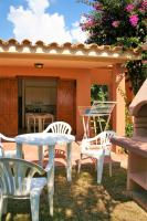 A patio or other outdoor area at Verdemare Sardegna Due Villette