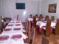 Telewizja i/lub zestaw kina domowego w obiekcie Hostal el Volao