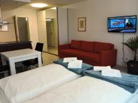 Televízia a/alebo spoločenská miestnosť v ubytovaní 305 Berlin, Studio Apartment, 38m2 2-4 Pers