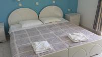 Postel nebo postele na pokoji v ubytování Kontessa Apartments