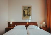 Postel nebo postele na pokoji v ubytování Hotel Central