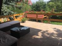 Vonkajšia záhrada v ubytovaní Wooden Apartman Prémium Jacuzzival
