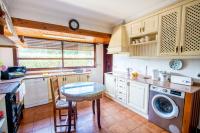 Kuchyň nebo kuchyňský kout v ubytování Azkorri Beach House