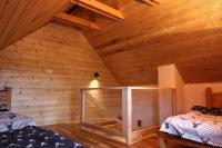 Posteľ alebo postele v izbe v ubytovaní Apartament Zielone Okiennice