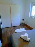 Posteľ alebo postele v izbe v ubytovaní Apartman Bella 1