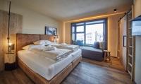 Posteľ alebo postele v izbe v ubytovaní THOMSN Central Hotel & Appartements
