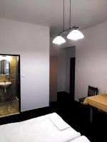 Postel nebo postele na pokoji v ubytování Hotel Praded Jesenik