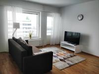 TV a/nebo společenská místnost v ubytování Majesteetti Apartments