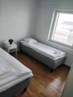 Postel nebo postele na pokoji v ubytování Majesteetti Apartments