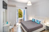 Postel nebo postele na pokoji v ubytování Villa Kavallaris & Apartments