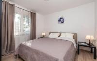 Posteľ alebo postele v izbe v ubytovaní Casa Fiorella Ika-Opatija