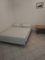 Postel nebo postele na pokoji v ubytování Apartments Soljacic