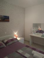 Postel nebo postele na pokoji v ubytování Apartments Soljacic