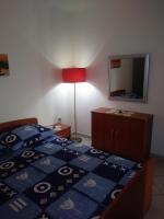 Postel nebo postele na pokoji v ubytování Apartments Soljacic